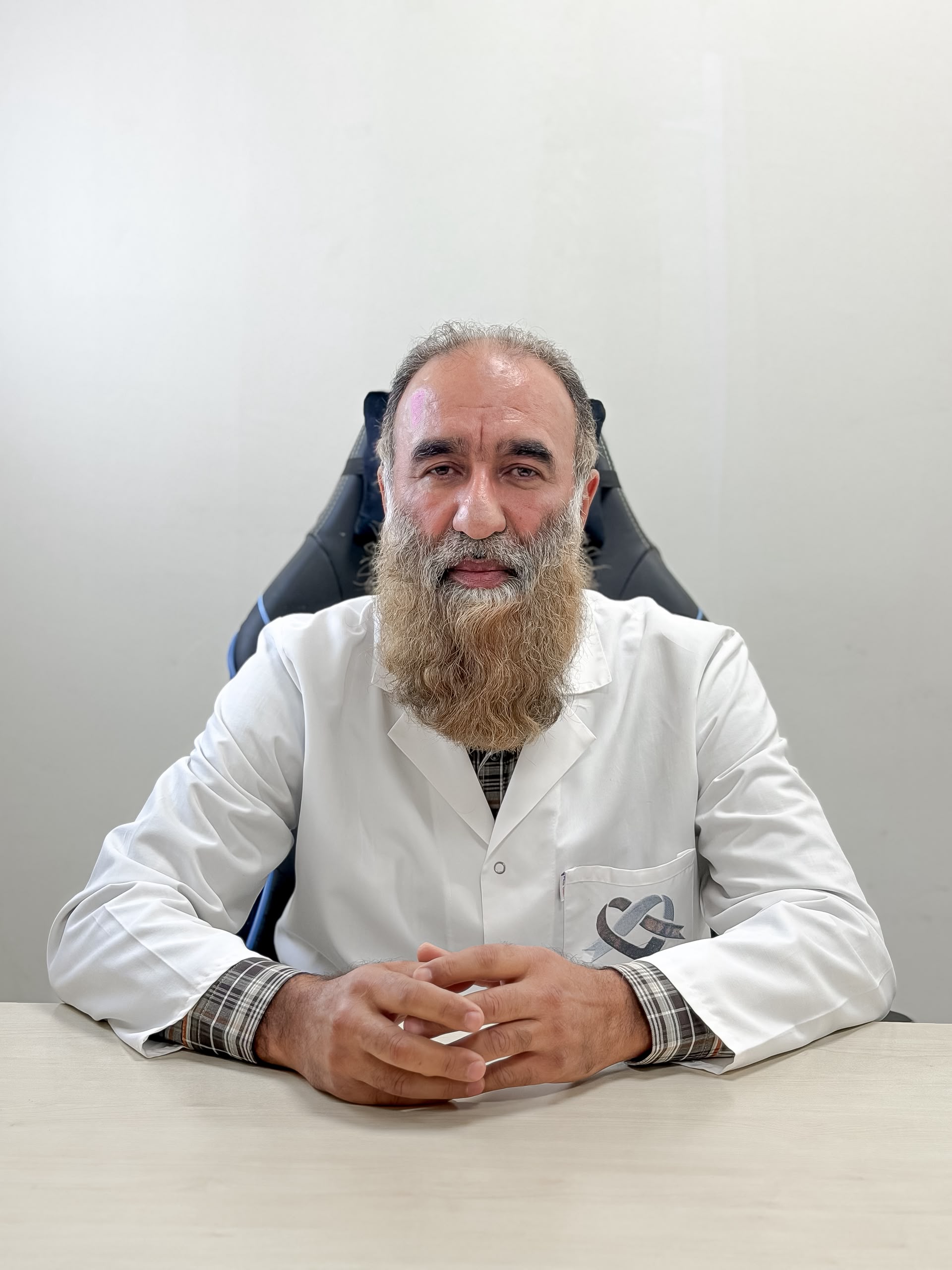 علي الملوقي